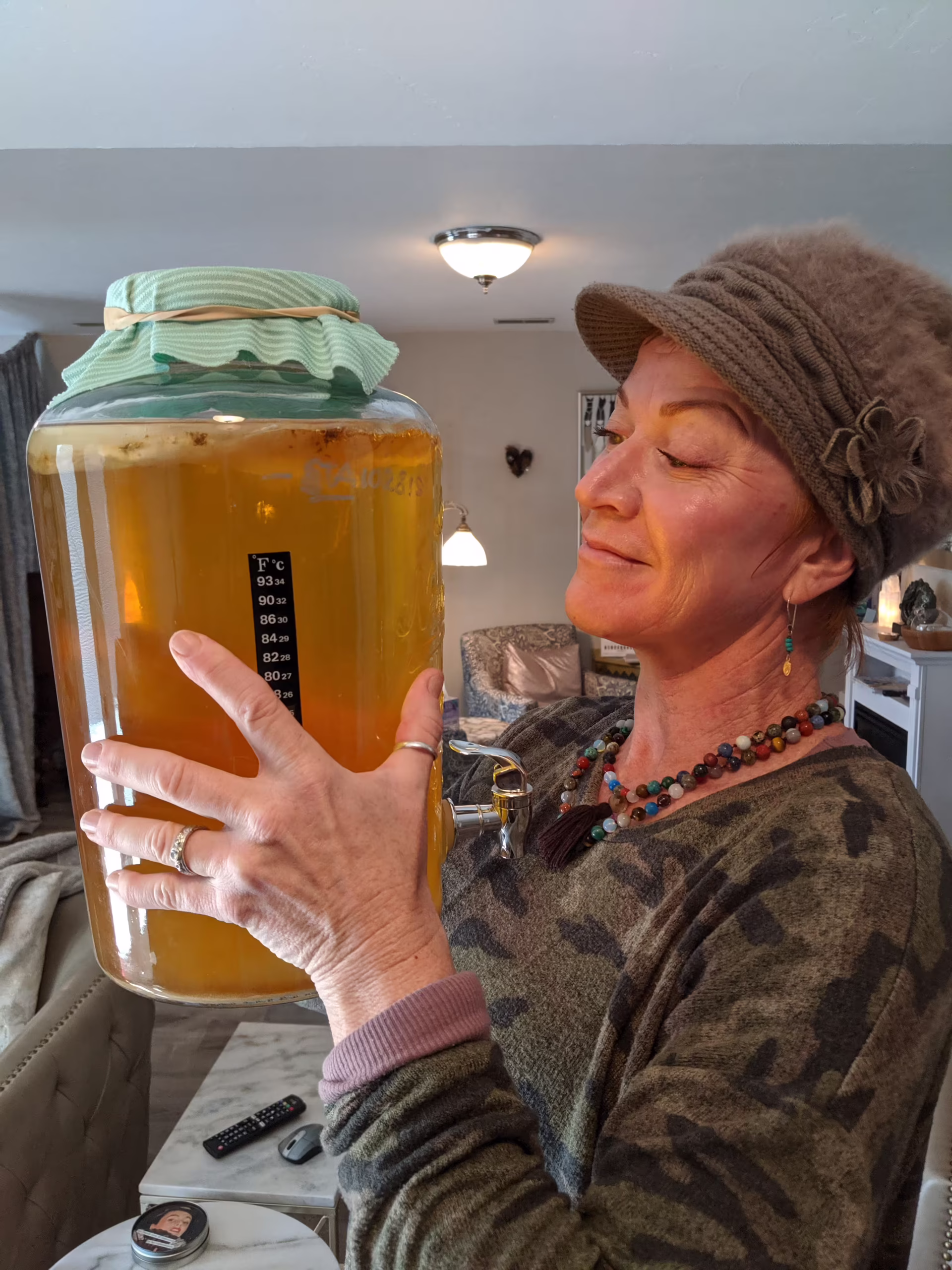 Janie Otero inspecting a SCOBY at the Springs Culture brewery